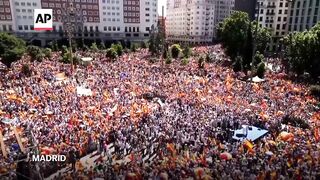 Opposition party stages mass protest in Madrid, on Spanish PM to elections.
