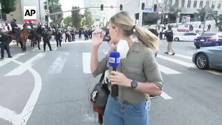 Australian reporter hit by nonlethal round while covering intensifying protests in Los Angeles.