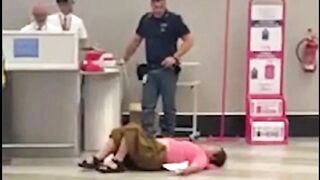 Woman lay down at airport to protest not being allowed to carry extra luggage, plane leaves her behind