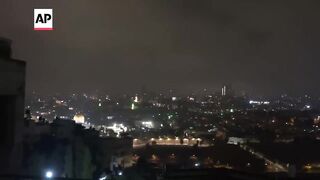 Missiles believed from Iran seen over Jerusalem.