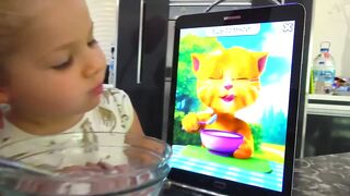 Daughter being happy by playing with cartoon