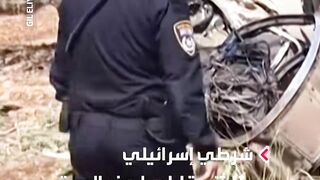 شرطي إسرائيلي يتفقّد بقايا صاروخ باليستي أُطلق من إيران وسقط في شمال إسرائيل #