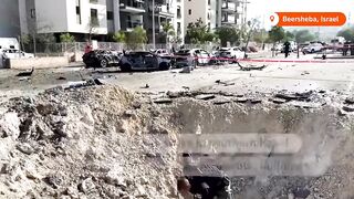 Iranian missile strike in Israel leaves crater and damages homes