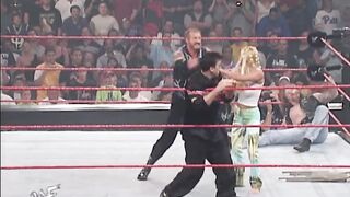 Diamond Dallas Page does his first Diamond Cutter in the WWF to Undertaker’s wife, Sara.