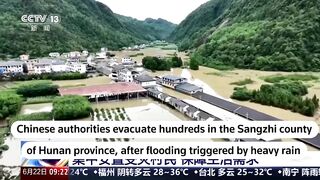 Mass evacuations in southern China amid severe flooding crisis