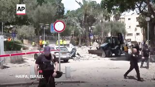 Haifa residents react to Iran missile strike in area.