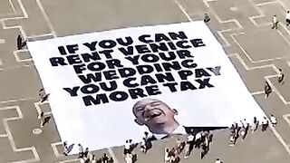 Activists Protest Bezos Venice Wedding With Tax Banner