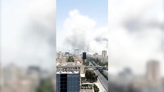 Israel Intensifies Strikes on Tehran as Iran Promises Retaliation