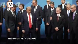 Leaders pose for photograph ahead of NATO summit.