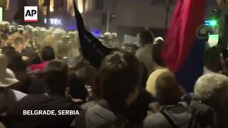 Anti-government protesters in Serbia detained during clashes with riot
