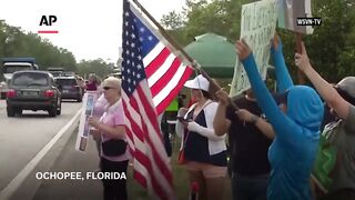 Protesters oppose Florida immigration detention site dubbed Alligator Alcatraz.mp4