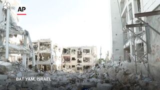 Germanys interior minister and Israels FM visit site of missile attack in