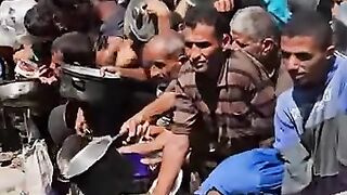 Gaza Crisis Deepens as Palestinians Seek Meals at Charity Kitchens