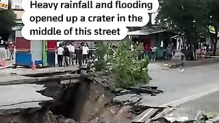 Central Colombia Street Crater Opens After Heavy Rain