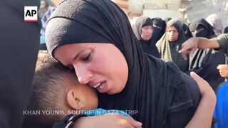 Mourners in Gaza say goodbyes to loved ones as war continues to claim