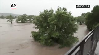 Video from bridge shows scope of deadly flood in