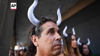 Animal rights activists protest against San Fermin bull runs in