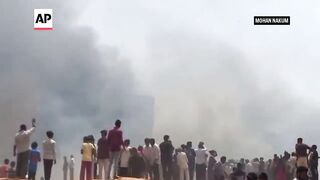 Air India passenger plane with 244 aboard crashes in