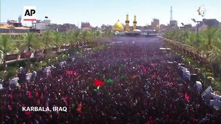 Tens of thousands of Shiite Muslims in Iraq mark