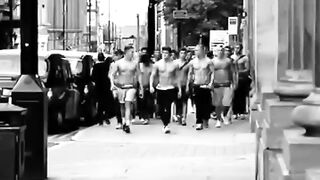 Gymnastics bodybuilders posing in public to impress cute girls.