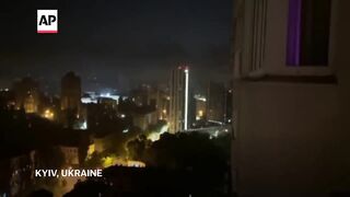 Kyiv residents sleep in metro station during a Russia attack in