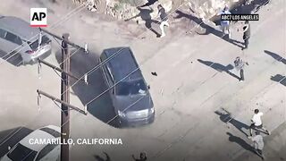 Protesters throw projectiles at cars after ICE raids at California