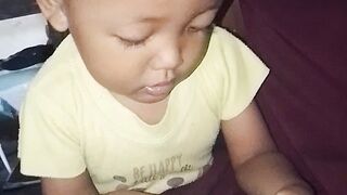 Kid talking about hello mama with phone cell