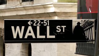 Wall Street Dips Amid Rising Trade Tensions with Canada