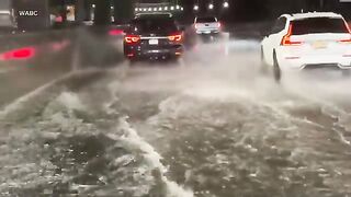 Heavy rains and flash flooding sweep across the Northeast