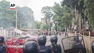 Bangladesh forces clash with supporters of ousted leader