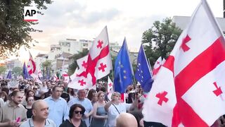 Thousands rally in Georgia capital to demand new parliamentary