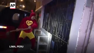 Police officer dressed as cartoon hero leads raid in