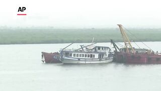 Tourist boat that capsized and killed at least 35 in Vietnam is towed to