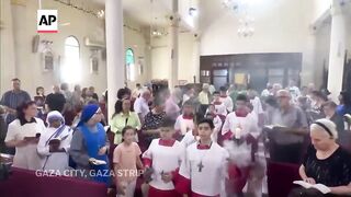 Faithful in Gaza City attend Mass after deadly Israel strike on