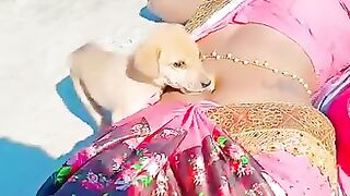 Some gives navel treat to a cute puppy