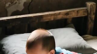 cute baby into the bed