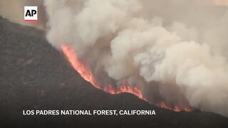 Massive wildfire in central California threatens homes, injures 3