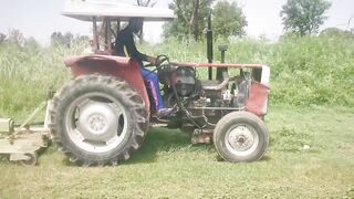 Grass Cutor Tractor  driving