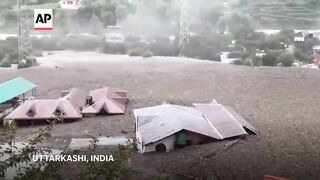Uttarakhand flash floods in India kill at least