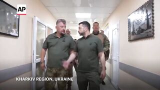 Zelenskyy visits troops at a military hospital in Ukraines