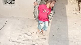 Bibi Baby is taking a swing, look, its very funny.