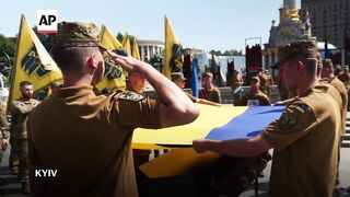 Mourners gather for funeral of fallen soldier in Kyiv, react to upcoming Ukraine
