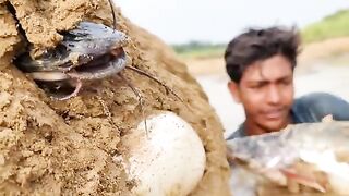 Amazing daily life fishing.Flowing water river dry hill underground big stuck fish catching # fishing