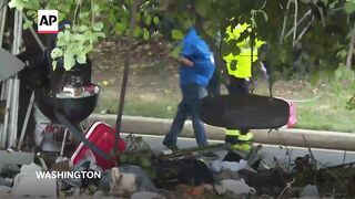 AP reporter gives tour of a closed homeless encampment in