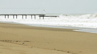Stormy Sea and Sandy Beach