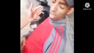 Boy sleeping with bike in road