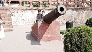 Children have a photoshoot with a cannon during a tour of the Badshahi Mosque in Lahore.