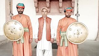 Abrar Habibi stands among soldiers during a tour of the Badshahi Mosque in Lahore.