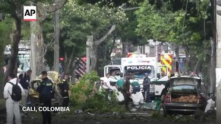 Car bomb and attack on helicopter in Colombia kill at least 17, including
