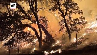 Firefighters battle growing wildfires in